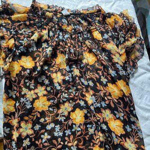 Sleeveless frilly neck floral top